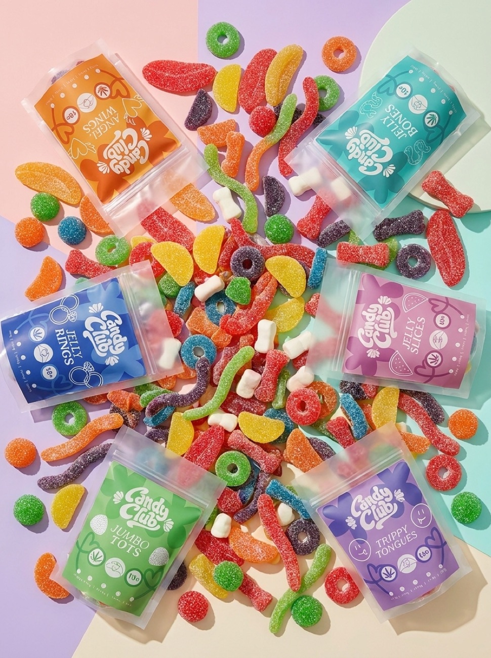 The Candy Club gummy pouches and assorted gummies arranged in a circle